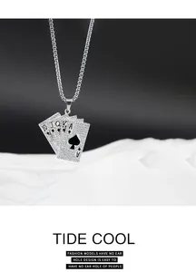 Close-up of hip-hop poker card pendant necklace with spade royal flush and rhinestones