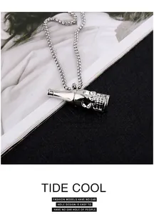 Close-up of skull beer bottle opener pendant necklace with stainless steel chain