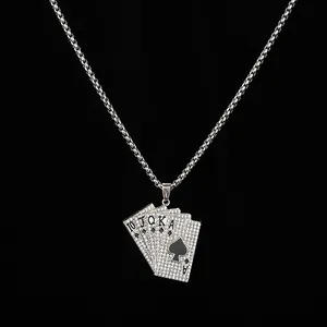 Detail of iced out Royal Flush poker pendant necklace with black spade in hip hop style