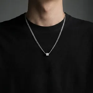 Minimalist titanium steel necklace with geometric cube pendant for unisex streetwear.