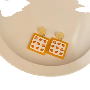 Cute orange pattern acrylic biscuit shaped drop earrings with unique design