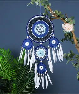 Attrape-rêves Mauvais Œil fait main avec plumes blanches pour décoration murale