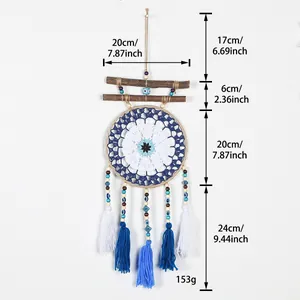 Detalles de las dimensiones y peso de 153g del atrapasueños de ojo turco bohemio.