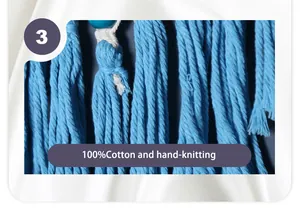 Macro detail of blue hand-knitted 100% cotton tassels on a bohemian dream catcher