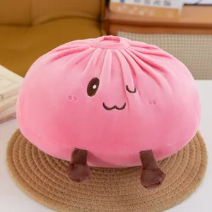 Close-up detail of cute pink bun plush toy with embroidered face and brown feet