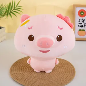 Close-up of a cute pink pig plush toy with a bow tie decoration in a cozy setting.