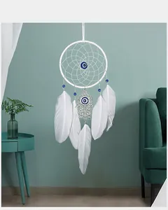 Handgemaakte witte dromenvanger met boze oog kralen en Hamsa hand hanger decor.