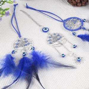 Attrape-rêves œil bleu à suspendre avec arbre de vie et plumes bleues vibrantes