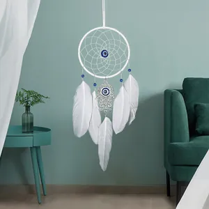 Handgemaakte dromenvanger met hand van Fatima en boze oog decoratie