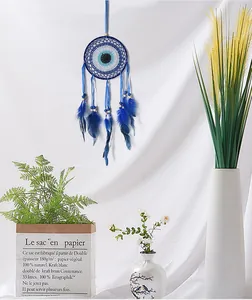 Acchiappasogni occhio del male con piume blu per la decorazione murale della casa
