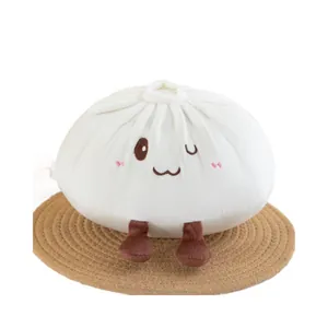 Creative and cute white baozi bun plush toy pillow with a smiling face on a woven mat