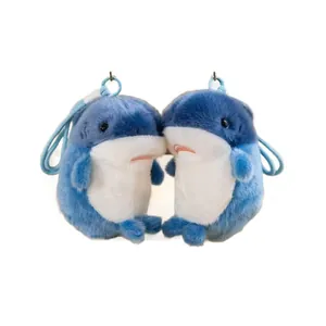 Pair of cute blue shark plush pendants for bags or keys, soft marine animal dolls