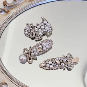 Luxus Künstliche Perle Schleife Entenschnabel-Clip Für Damen Silber Legierung Strass Hund Haarspange Elegantes Seitenhaar-Accessoires