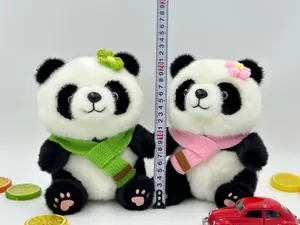 Two cute panda plush toys with scarves showing 22cm height with a measuring tape