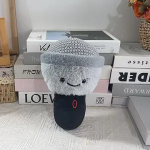 Cute microphone plush toy with a friendly smiley face and soft fuzzy texture details