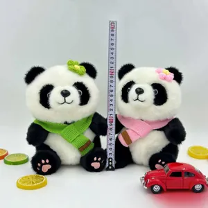 Cute panda plush toys with colorful knitted scarves and measurement tape for size