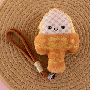 Close-up of cute Goujian sword plush keychain with smiling face and brown lanyard.