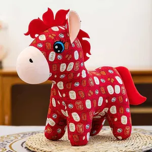 Detailed view of traditional patterns on a red Chinese zodiac horse plush toy