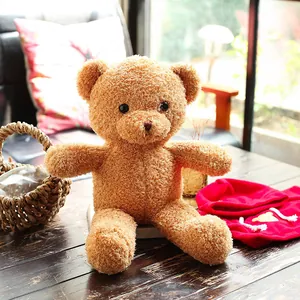 Detailed view of a soft brown seaweed velvet teddy bear plush toy with curly fur