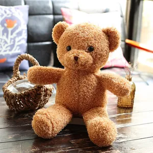 Macro view of a brown teddy bear plush toy showing the soft curly rose velvet fur texture