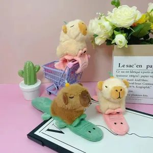 Detailed macro view of adorable Capybara plush slap bracelets in various soft pastel colors