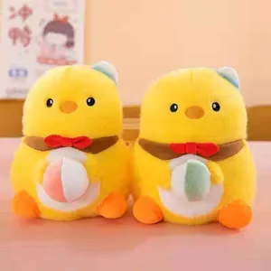 Detailed view of two cute 8-inch yellow chick plush dolls with colorful accents