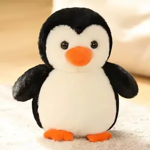 Peluche de pingüino suave con lindo pico naranja y pelaje esponjoso blanco y negro