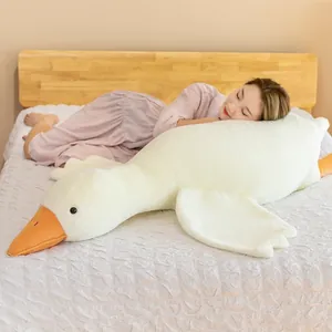 Giant white goose plush toy pillow for sleeping on bed with incredibly soft texture