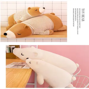 Ours polaire et ours brun en peluche portant des chemises à rayures en tailles
