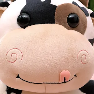 Detailed close-up of a cute cow plush toy featuring soft texture and playful expression