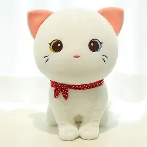 Cute white plush cat toy with heterochromia eyes and red polka dot ribbon