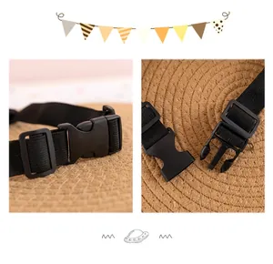 Detail view of the adjustable black elastic strap with plastic side-release buckle.