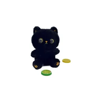 Detailed view of an adorable black plush cat doll with large golden eyes and citrus props