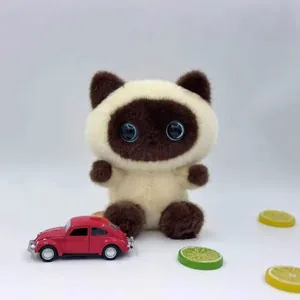 Adorable Siamese cat plush toy desk ornament with expressive blue eyes and soft fur texture