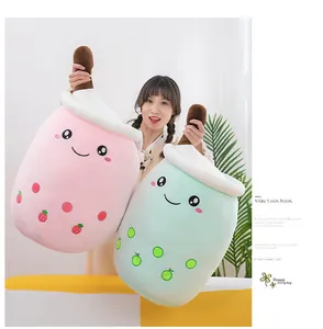 Cute oversized bubble tea cup plush pillows in pink and mint green for kids and adults