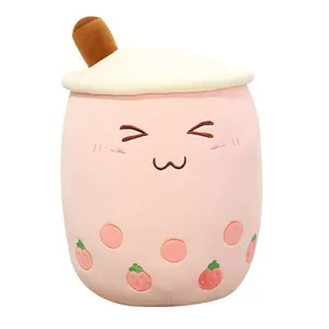 Cute pink bubble tea cup plush toy with strawberry patterns and a kawaii expression