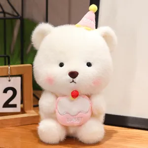 Macro detail of a soft white plush birthday bear wearing a pink party hat and cake