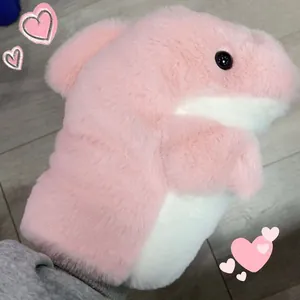 Soft pink and white plush shark hand puppet toy showing fuzzy texture and cute design details