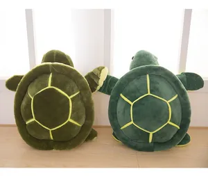 Rear view of two cute green turtle plush toys showing high quality soft plush shell texture