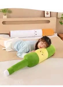 Long plush pillows shaped like cigarette and wine bottle used in bedroom scenario