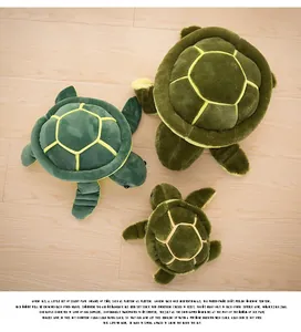 Detailed close-up shot of three cute green plush sea turtle toys on a wood floor