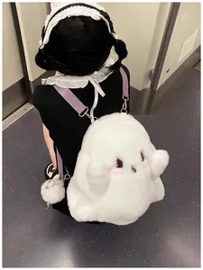 Cute white plush ghost backpack for girls worn in a lifestyle subway train setting