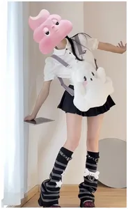Kawaii white plush ghost backpack for women worn with Japanese Harajuku style outfit