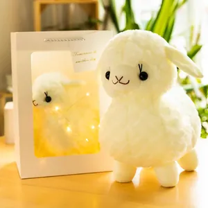 Adorabile peluche di alpaca bianco con confezione regalo e luci a stringa