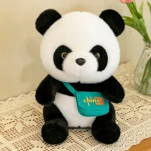 Detailed macro view of a cute and soft panda plush toy wearing a green crossbody bag