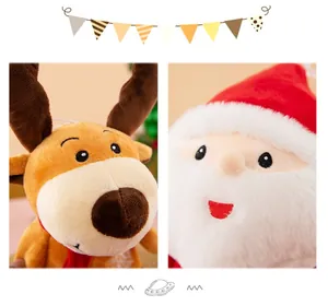 Detailansicht von niedlichen Weihnachts-Plüschfiguren mit Rentier und Weihnachtsmann