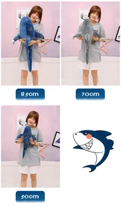 Comparison of 85cm, 70cm, and 50cm galaxy shark plush toy pillows held by a model.