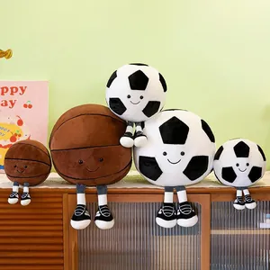 Adorable soccer and basketball plush ball toys with cute smiling faces on shelf