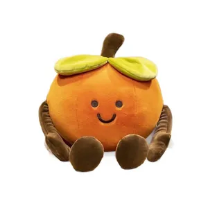 Detailed view of soft persimmon plush toy featuring a cute smiley face and green leaves