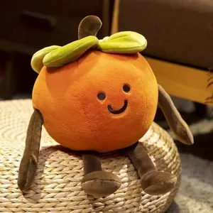Close-up of creative persimmon plush toy with smiley face and long limbs on ottoman
